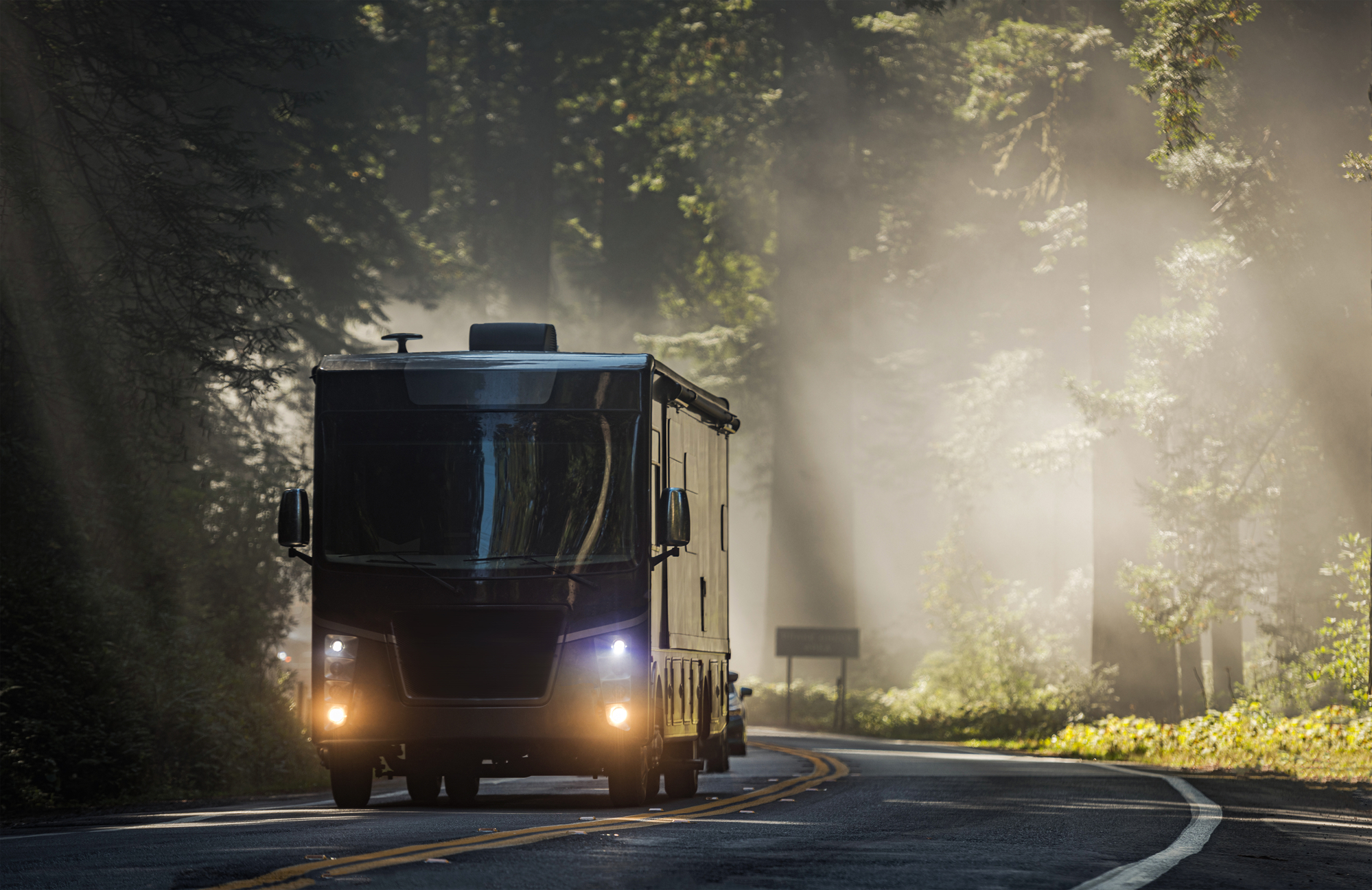 Diesel Pusher Motorhome RV on a Scenic California Highway RV Inspection Services